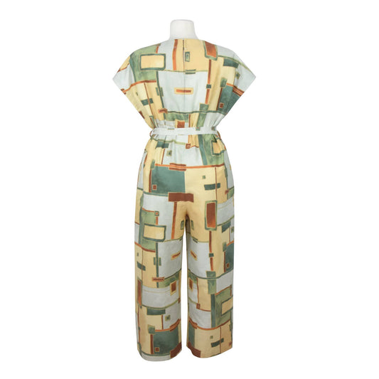 Upcycling summer overall for women with short sleeves. V neck, loose fit with belt at the waist, pants length above the ankle. Upcycled cotton fabric with brown, beige, green, squares pattern.