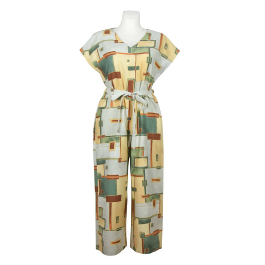 Upcycling summer overall for women with short sleeves. V neck, loose fit with belt at the waist, pants length above the ankle. Upcycled cotton fabric with brown, beige, green, squares pattern.